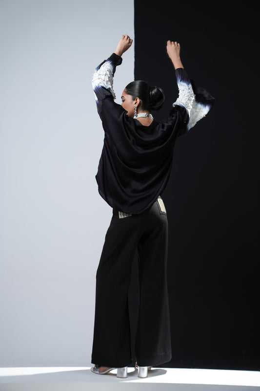 Black satin shirt with white shibori work on the sleeves