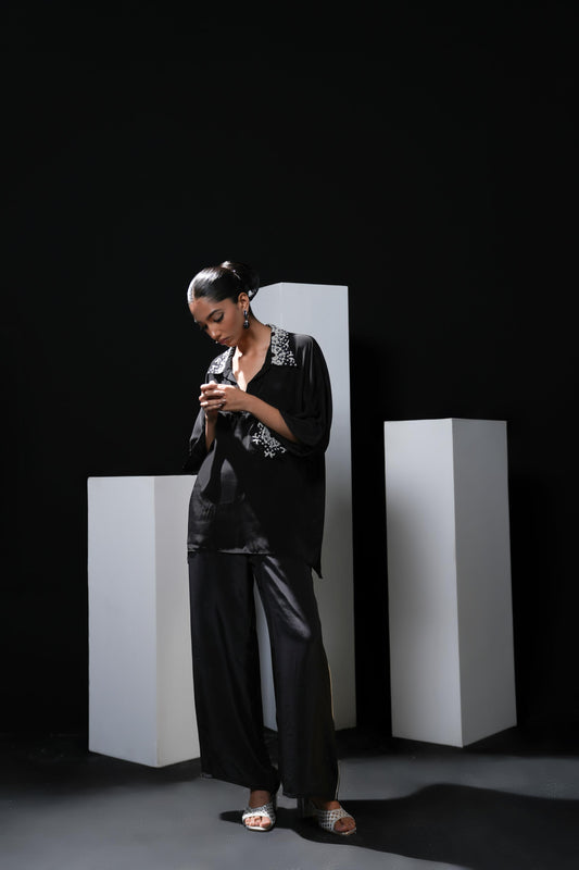 Crepe black coord set with pearl detailing on the pocket, collars and trousers