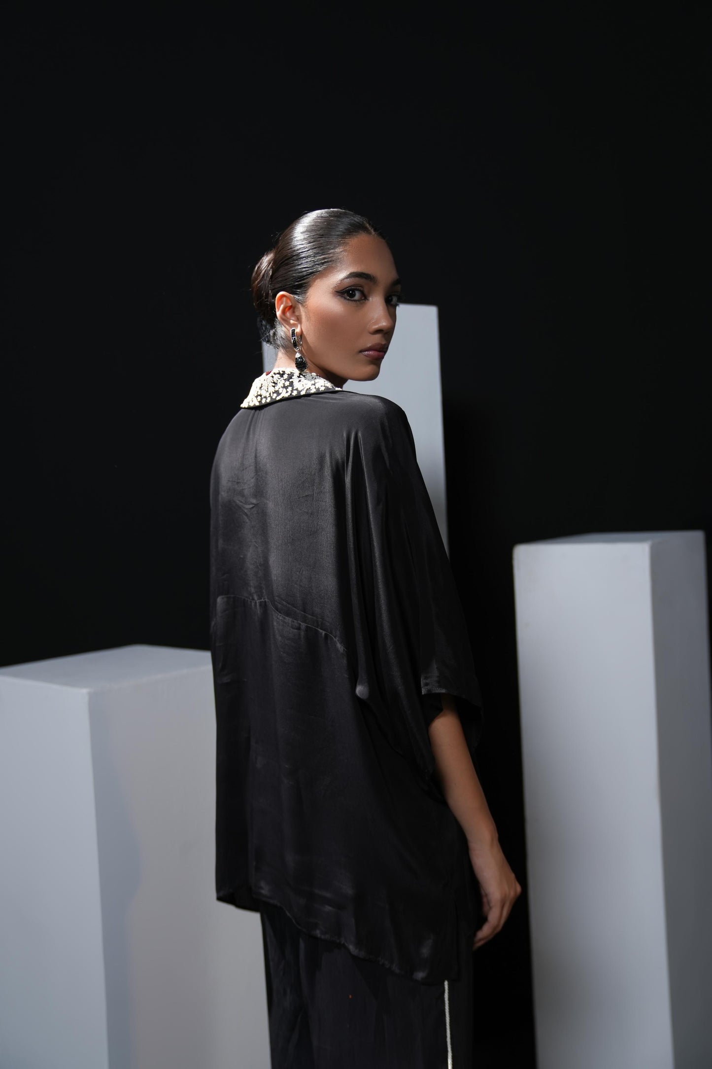 Crepe black coord set with pearl detailing on the pocket, collars and trousers