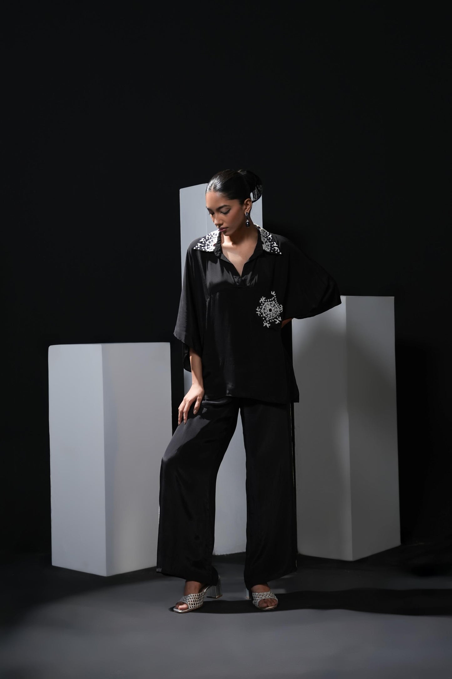 Crepe black coord set with pearl detailing on the pocket, collars and trousers
