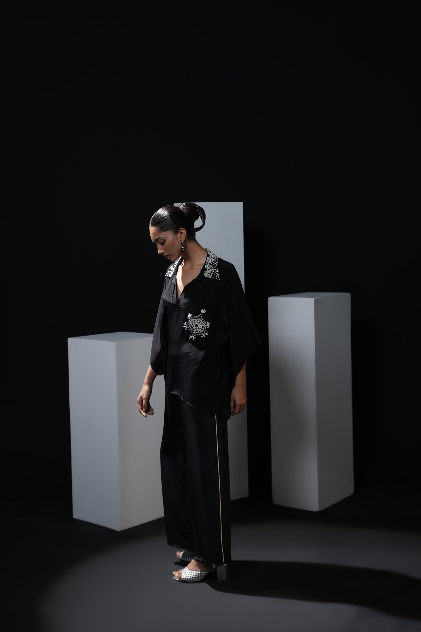 Crepe black coord set with pearl detailing on the pocket, collars and trousers