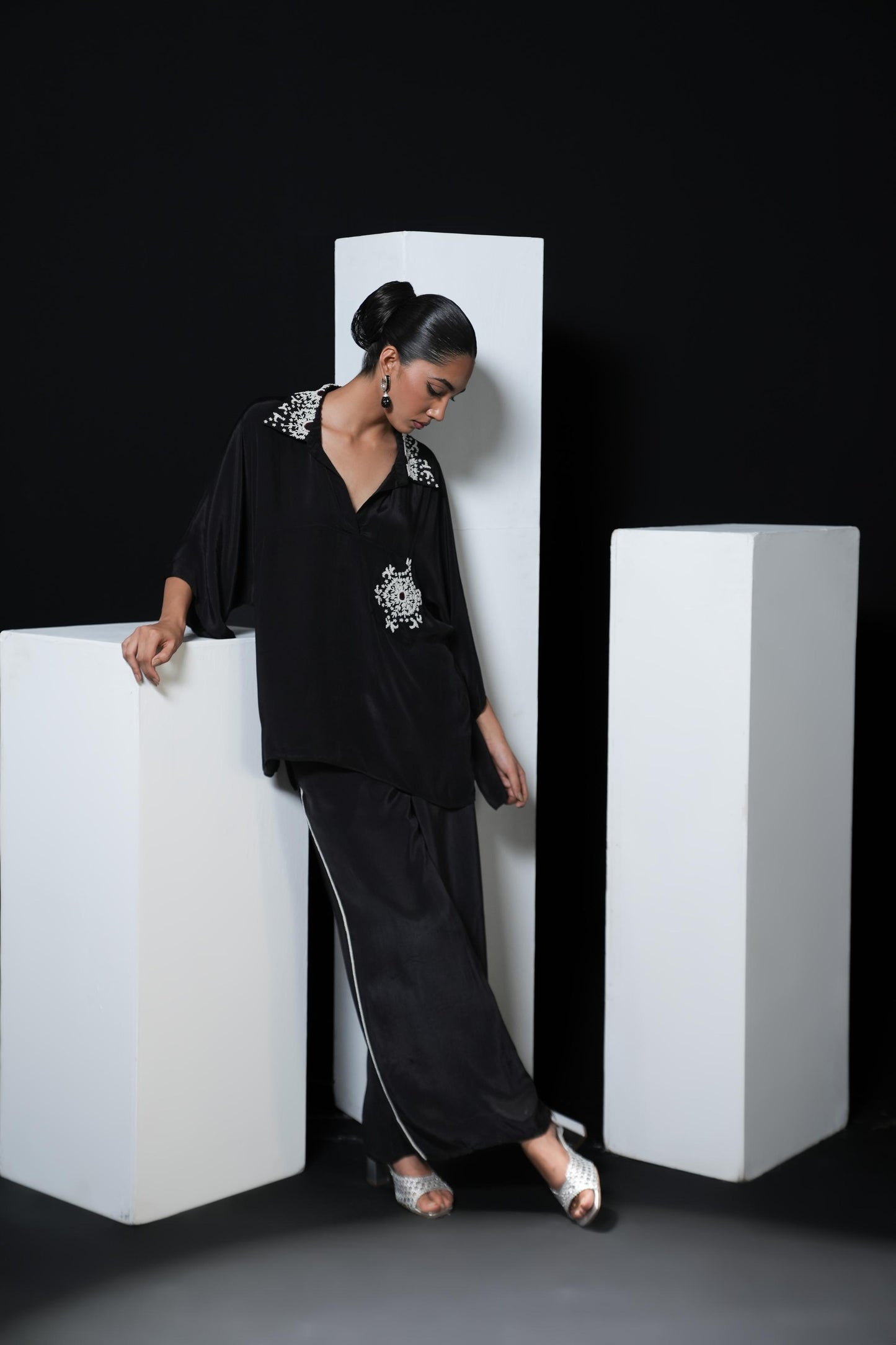Crepe black coord set with pearl detailing on the pocket, collars and trousers