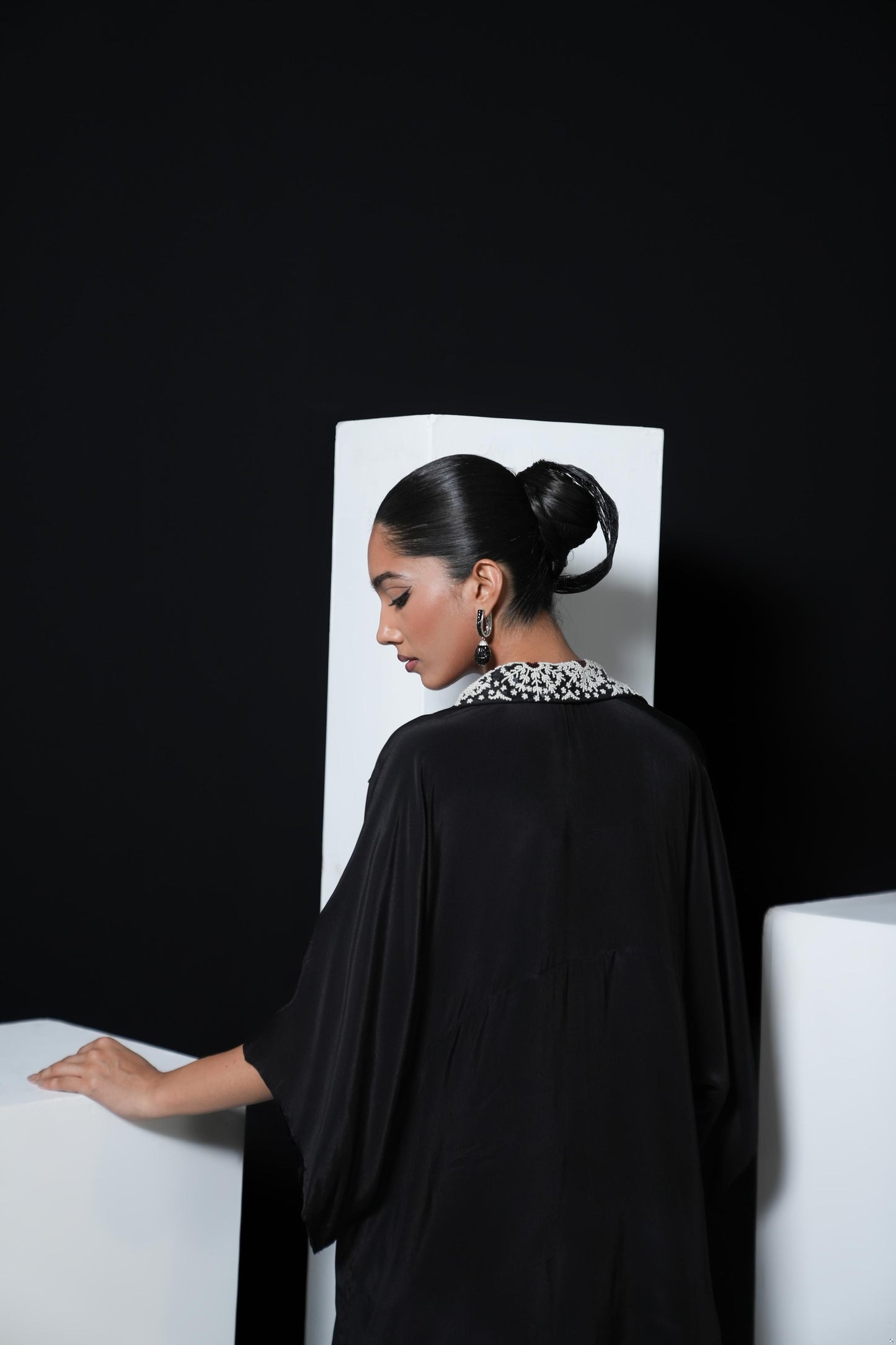 Crepe black coord set with pearl detailing on the pocket, collars and trousers