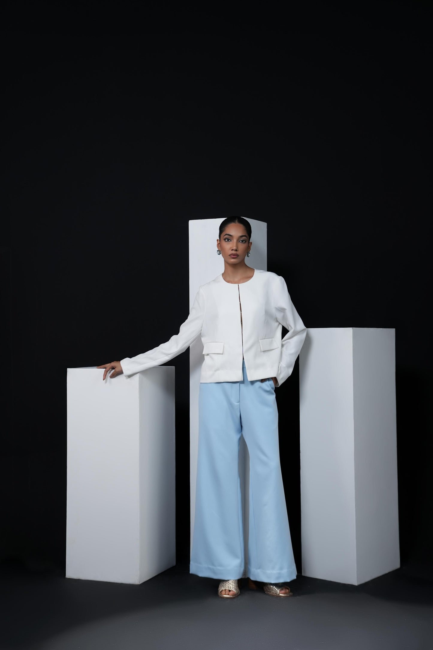 Sky blue trousers with swaroski detailing on the pockets
