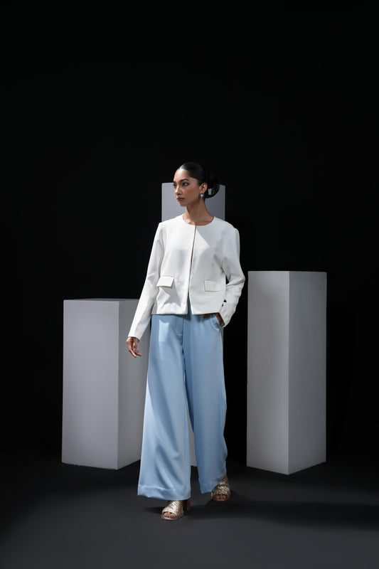 Sky blue trousers with swaroski detailing on the pockets