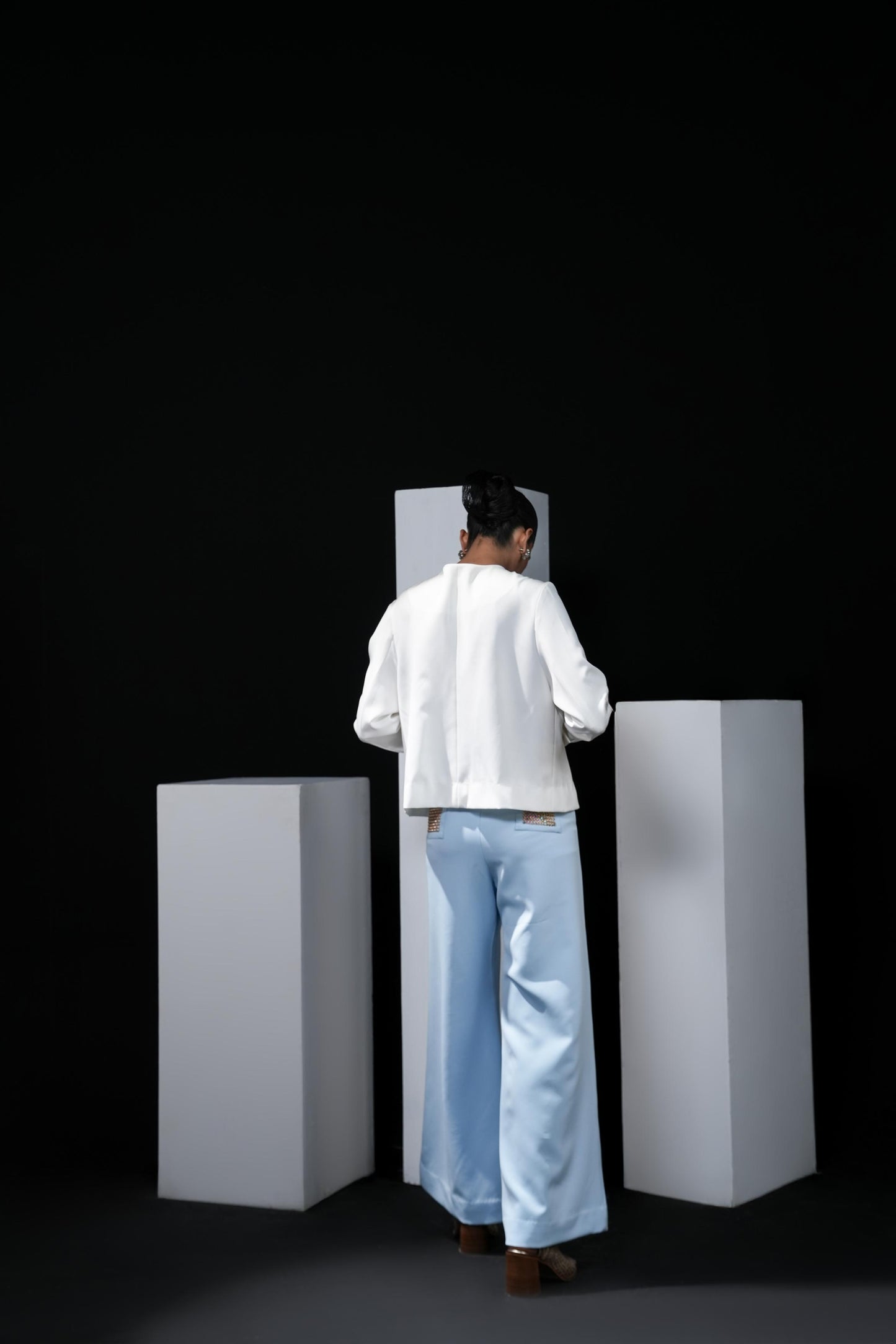 Sky blue trousers with swaroski detailing on the pockets
