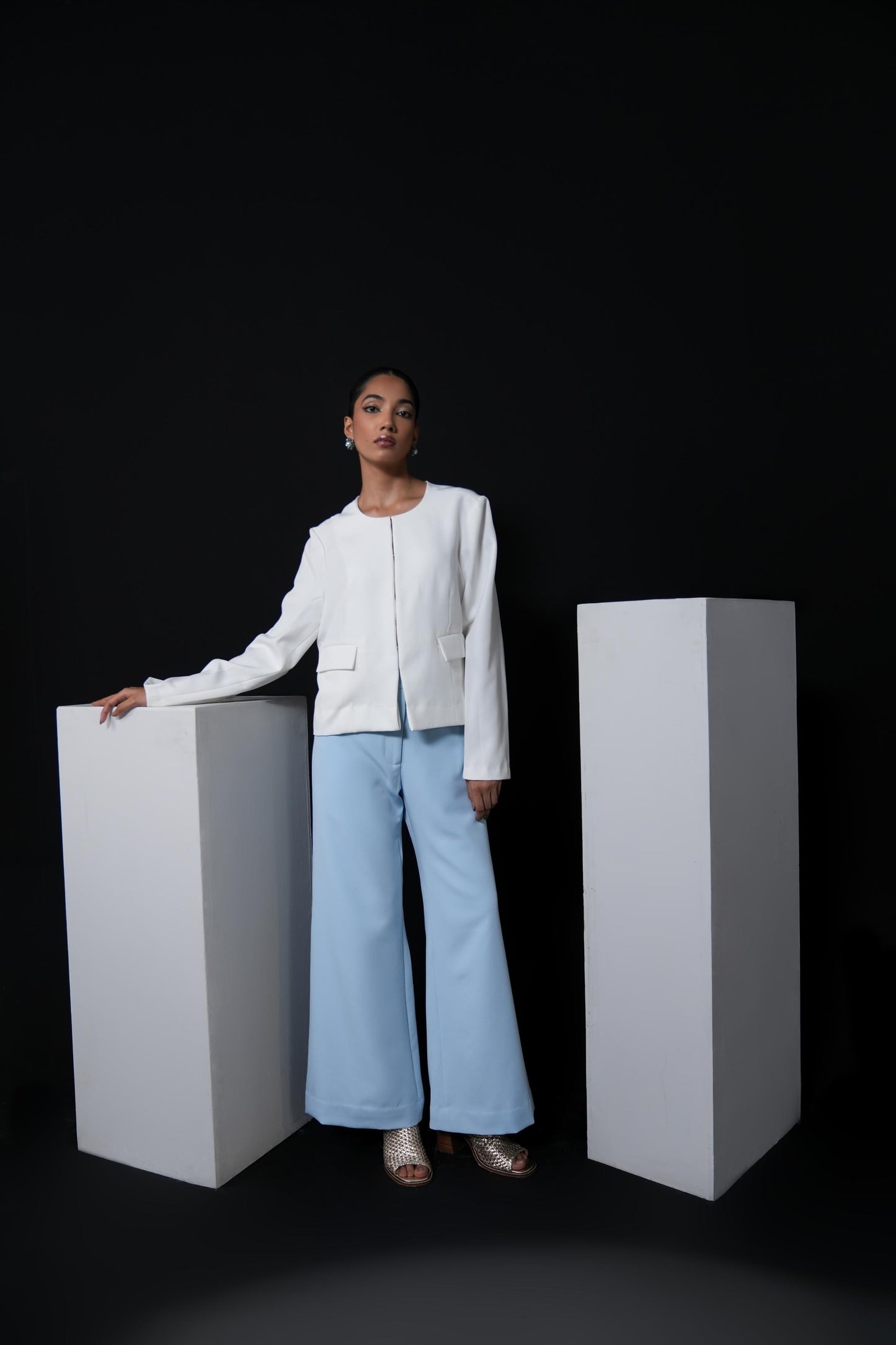 Sky blue trousers with swaroski detailing on the pockets