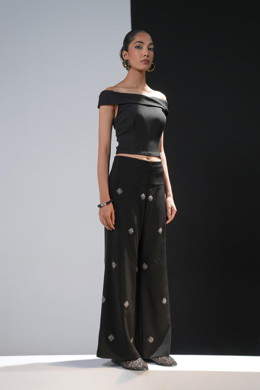 Black boot cut trousers with swaroski embelishments