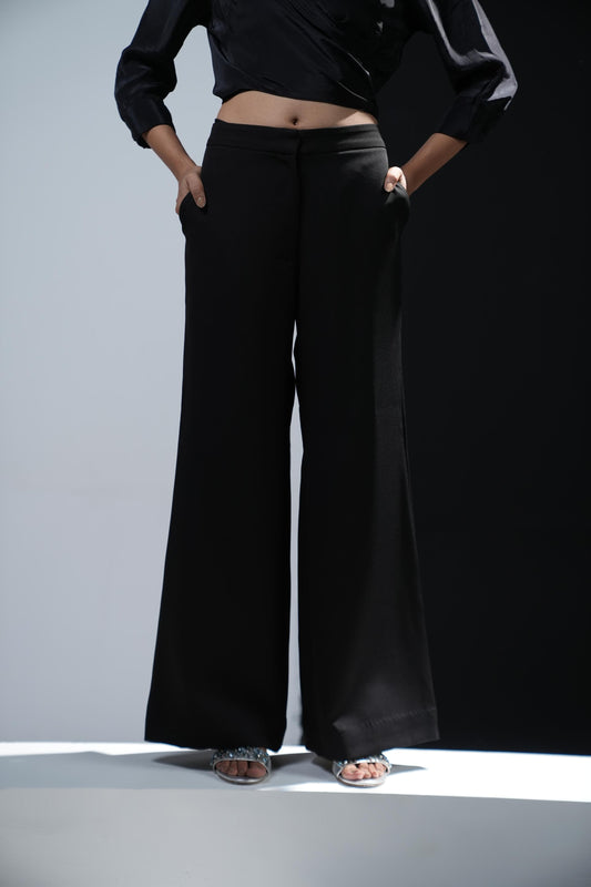 Black bootcut trousers with swaroski detailed pockets