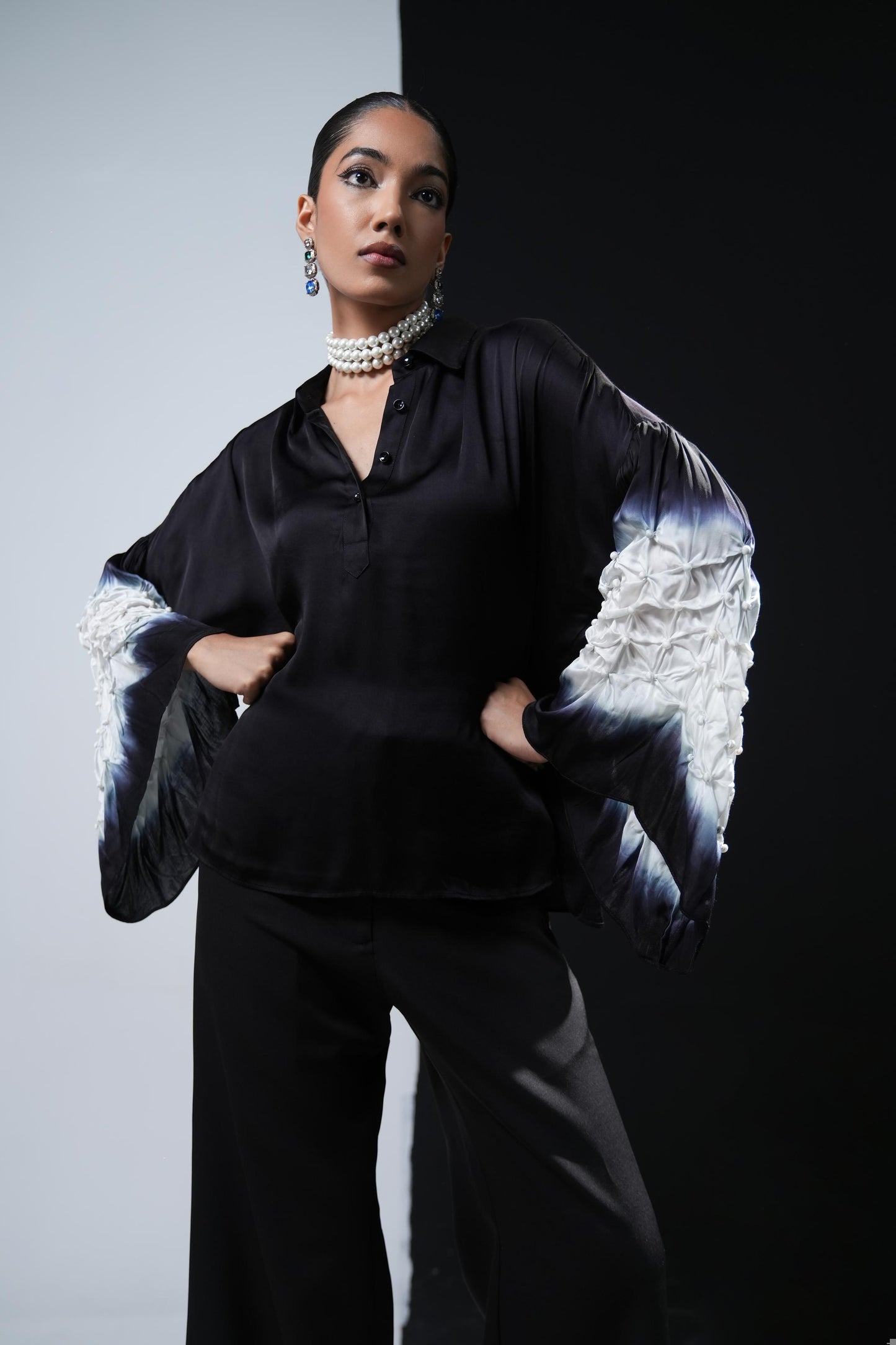 Black satin shirt with white shibori work on the sleeves