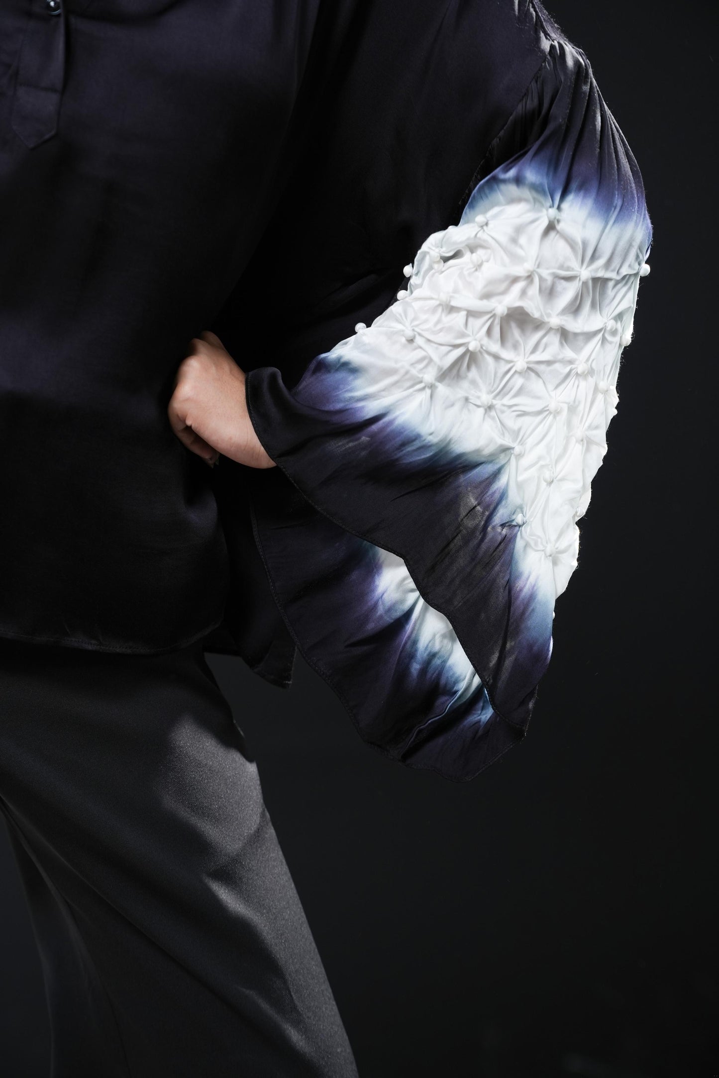 Black satin shirt with white shibori work on the sleeves