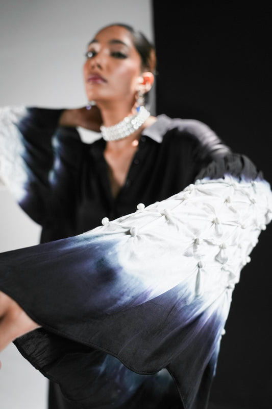 Black satin shirt with white shibori work on the sleeves