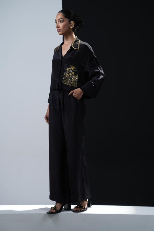 Crepe coord set with short flowing shirt and tonal gold zardosi detailing paired with black trousers